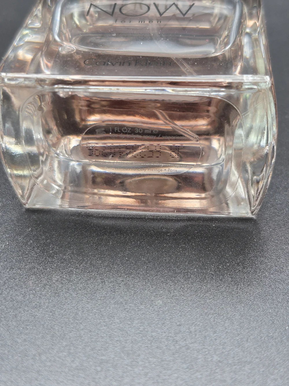 Calvin Klein Eternity Now for Men - Clear Glass Bottle with Pale Amber Liquid